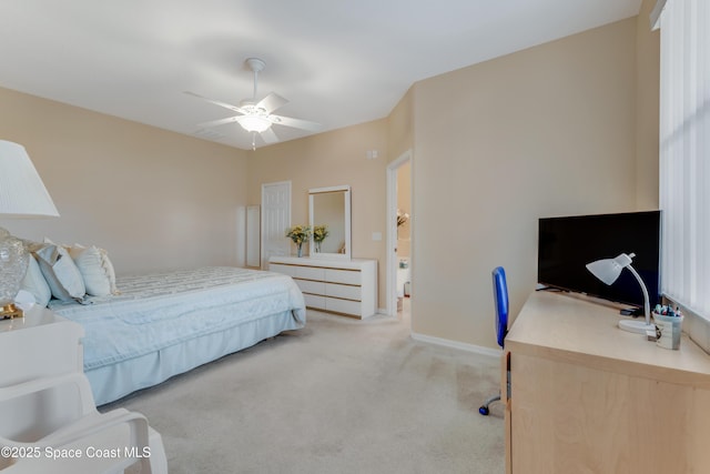 bedroom featuring light colored carpet and ceiling fan