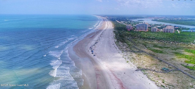 aerial view featuring a water view and a beach view