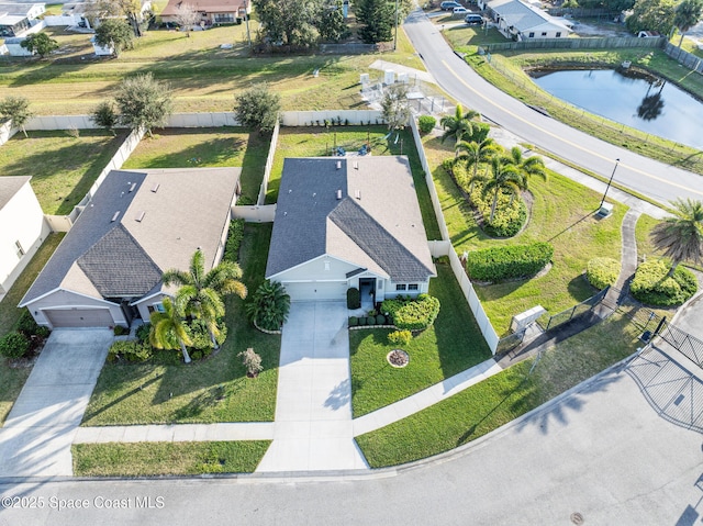 drone / aerial view with a water view