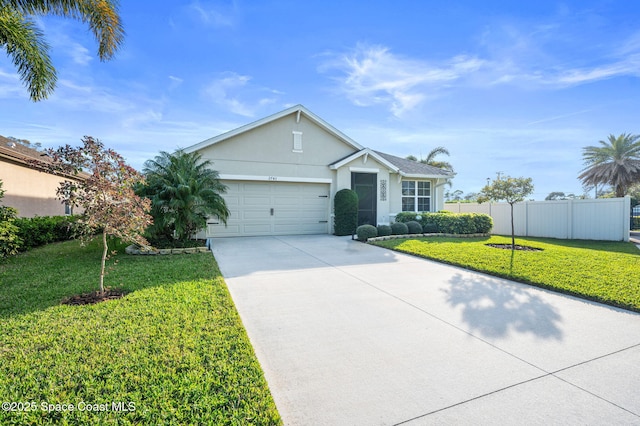 single story home with a garage and a front yard