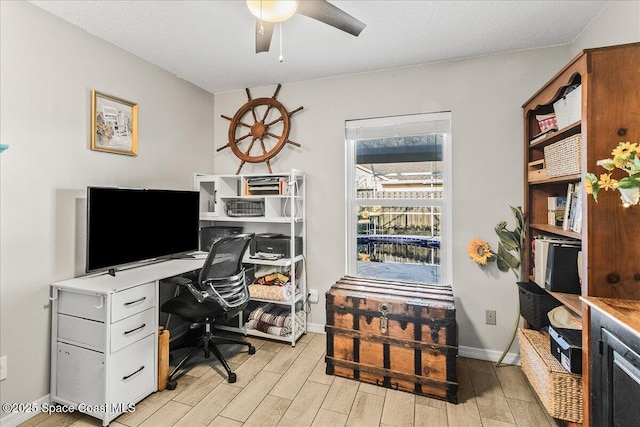 office area featuring ceiling fan and light hardwood / wood-style floors