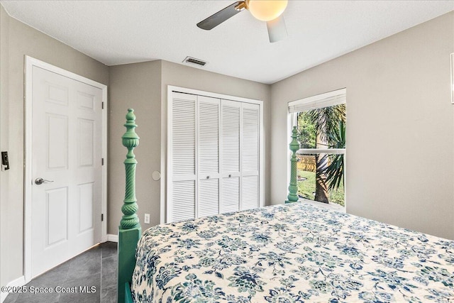 bedroom featuring a closet and ceiling fan