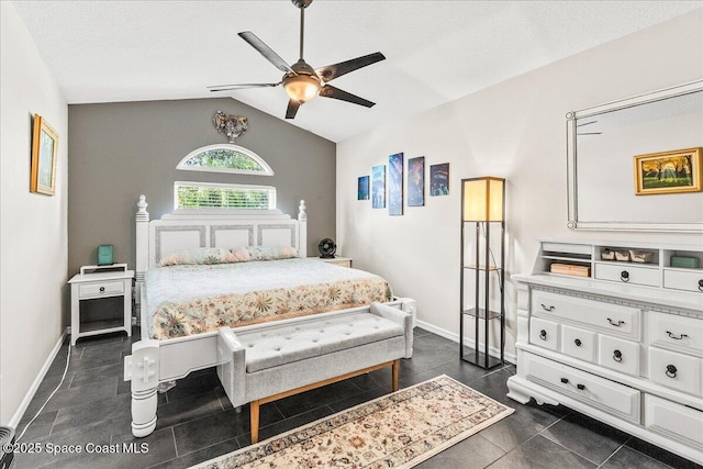 bedroom with ceiling fan and vaulted ceiling