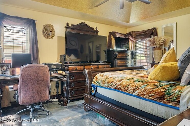 bedroom with multiple windows, vaulted ceiling, a textured ceiling, and ceiling fan