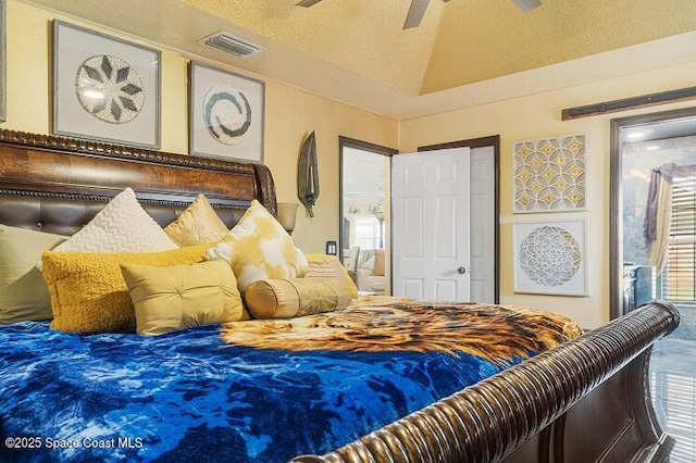 bedroom with vaulted ceiling and ceiling fan