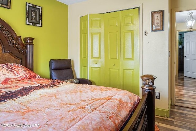 bedroom featuring dark wood-type flooring