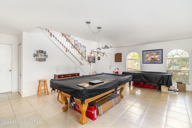 game room featuring pool table and light tile patterned flooring