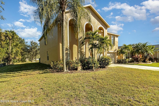 view of property exterior featuring a yard