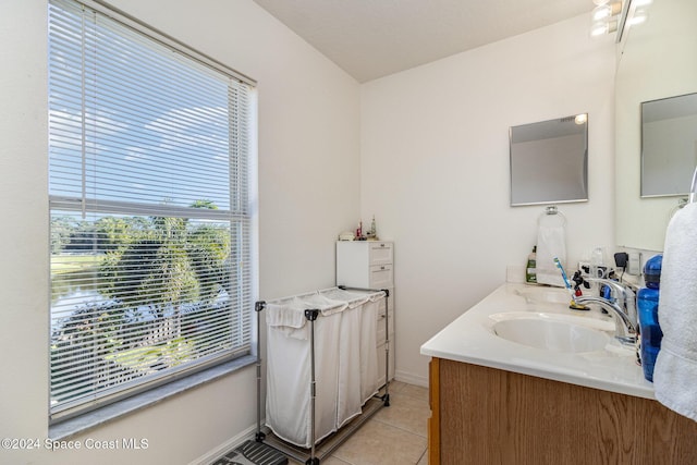 bathroom featuring vanity and tile patterned flooring