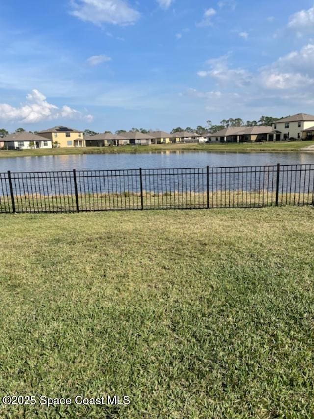 view of yard with a water view