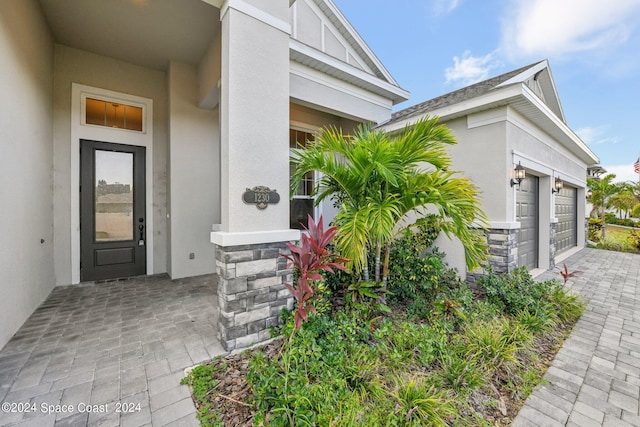 property entrance featuring a garage