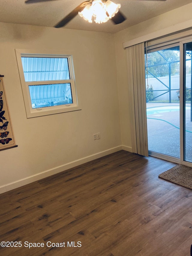 spare room featuring dark hardwood / wood-style flooring