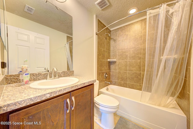 full bathroom with vanity, toilet, a textured ceiling, and shower / bath combo with shower curtain