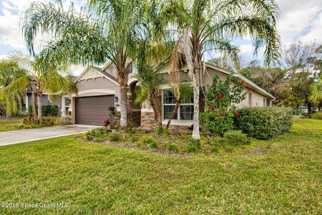 view of front of home featuring a garage and a front yard