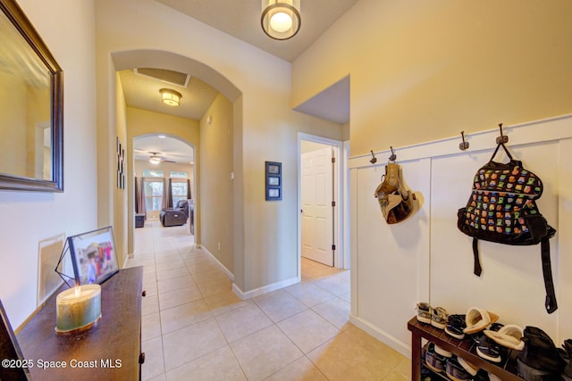 corridor featuring light tile patterned flooring