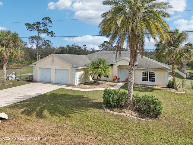 ranch-style home featuring a garage and a front lawn