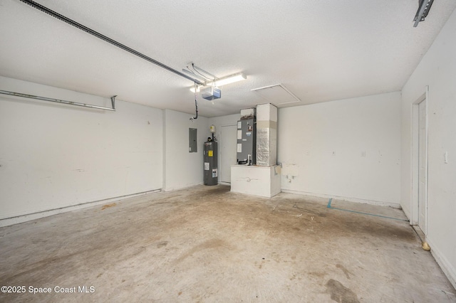 garage featuring a garage door opener, electric panel, electric water heater, and heating unit