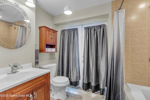 full bathroom featuring vanity, tile patterned flooring, shower / bath combo, and toilet