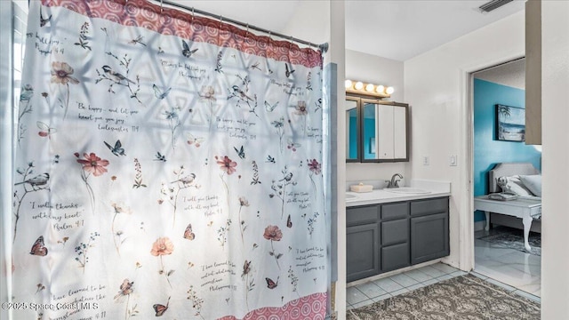 bathroom with vanity and curtained shower