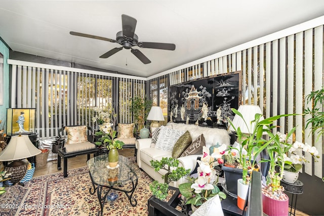 sunroom featuring ceiling fan