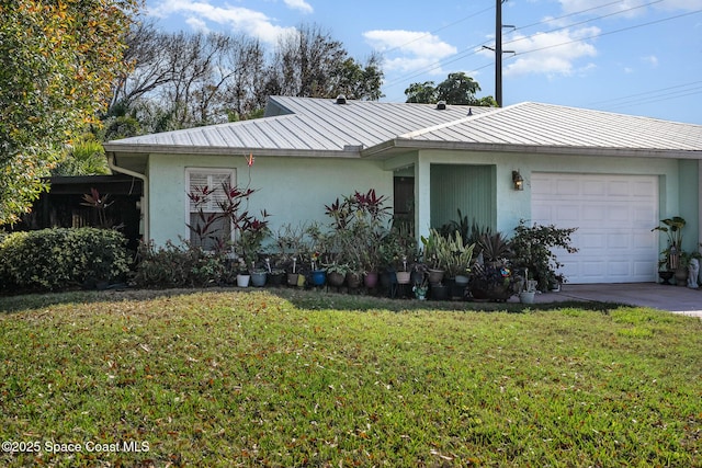 single story home featuring a garage and a front lawn