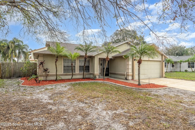 ranch-style house with a garage and a front lawn