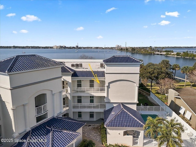 drone / aerial view featuring a water view