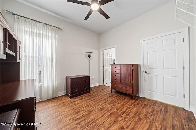 unfurnished bedroom with wood-type flooring and ceiling fan