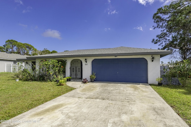 ranch-style house with a garage and a front yard