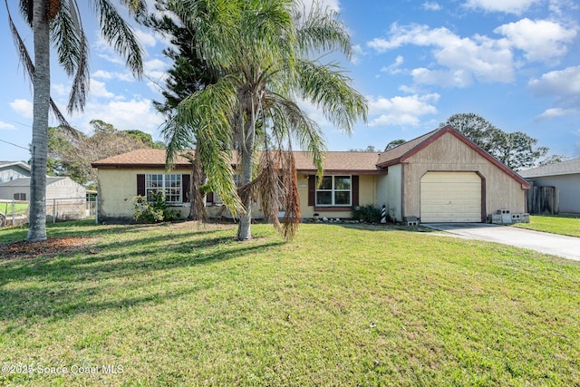 ranch-style house with a garage and a front lawn