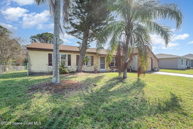 ranch-style home with a front lawn