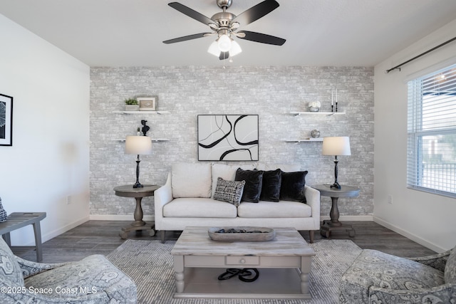 living room with hardwood / wood-style floors and ceiling fan