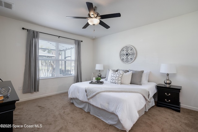 bedroom with ceiling fan and carpet flooring