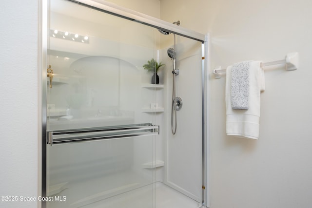 bathroom with an enclosed shower