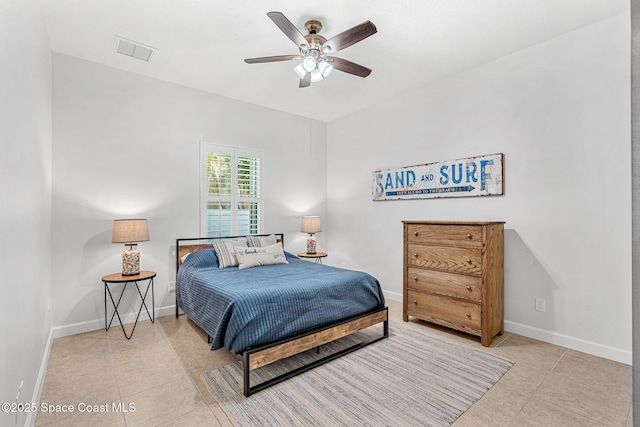 bedroom with light tile patterned floors and ceiling fan