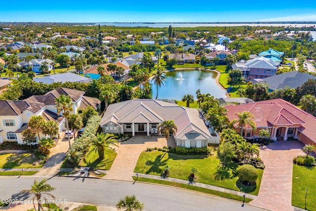 drone / aerial view with a water view