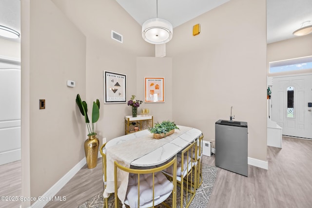 dining room featuring light hardwood / wood-style floors