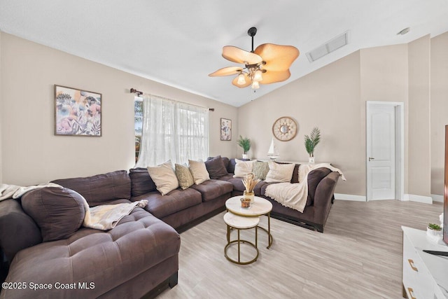 2631 Canterbury Cir, Rockledge, FL 32955 - living room with vaulted ceiling, ceiling fan, and light hardwood / wood-style flooring