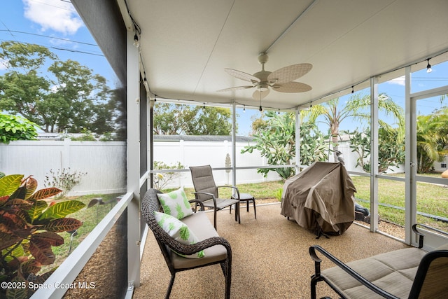 sunroom / solarium with ceiling fan