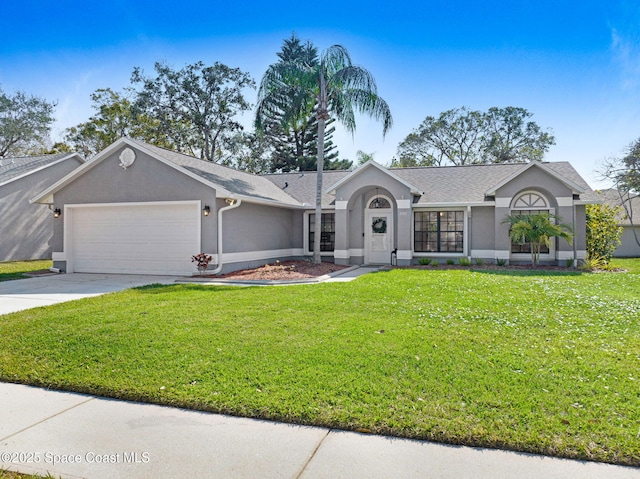 ranch-style home with a garage and a front lawn