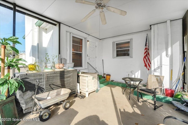 view of patio / terrace featuring ceiling fan