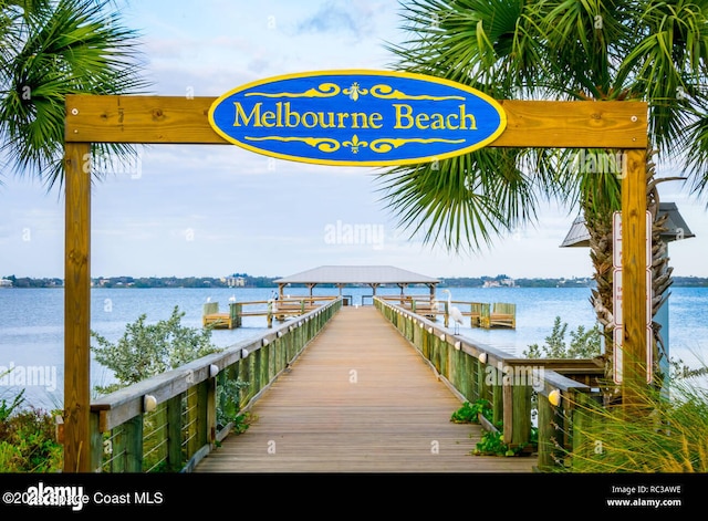 dock area featuring a water view and a gazebo