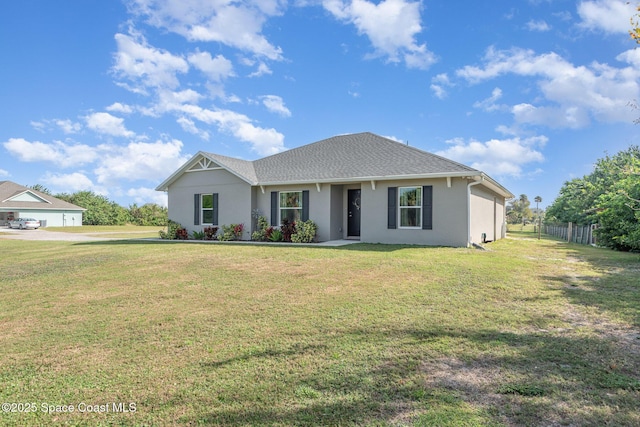 single story home with a front lawn