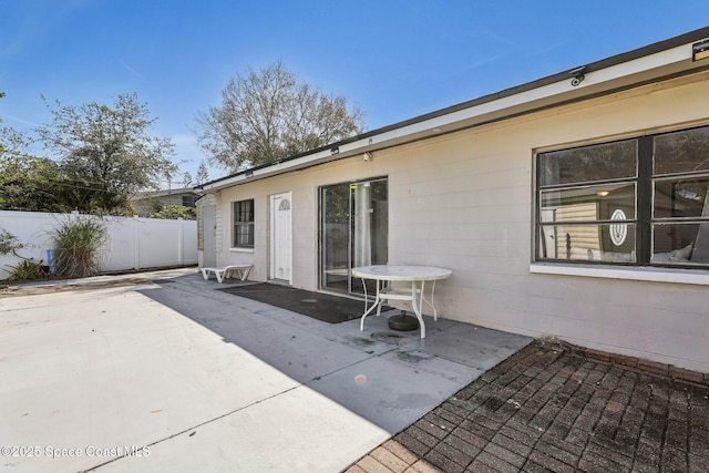 rear view of house featuring a patio