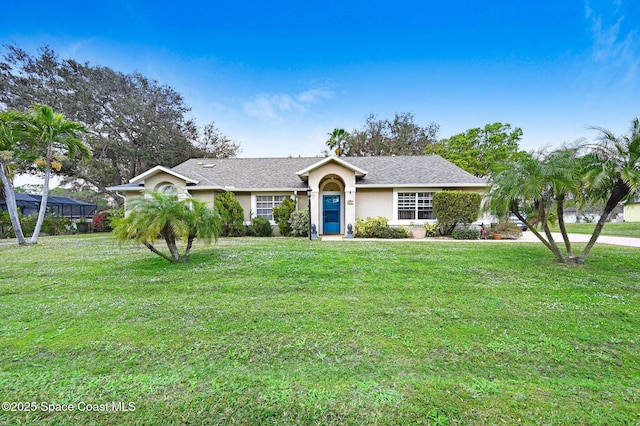 ranch-style home with a front lawn