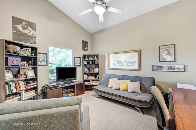 living room with high vaulted ceiling and ceiling fan