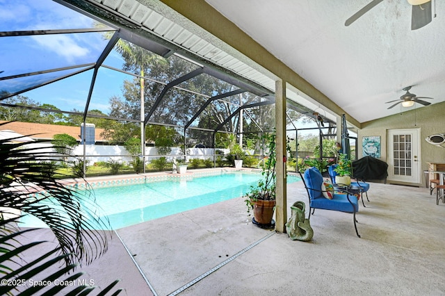 view of pool with a patio and a lanai