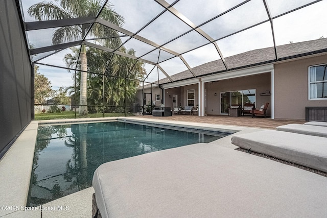 view of swimming pool featuring an outdoor hangout area, a lanai, a patio area, and ceiling fan