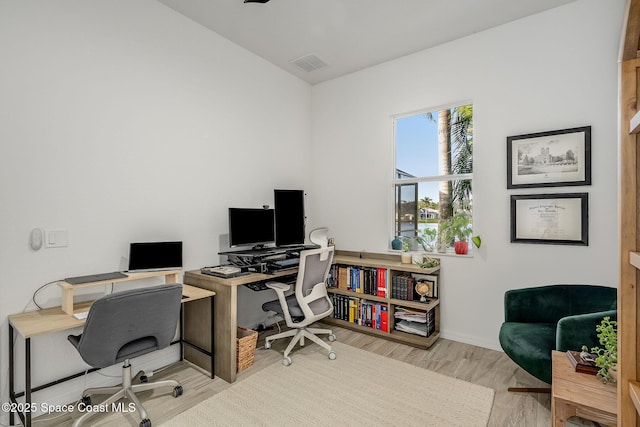 office space featuring light hardwood / wood-style flooring