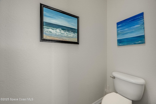 bathroom featuring toilet